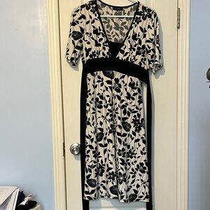 B. Smart Black and Cream Floral Midi Dress